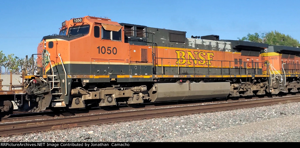 BNSF 1050, one of a kind Heritage 1 unit, trails on EB BNSF stack